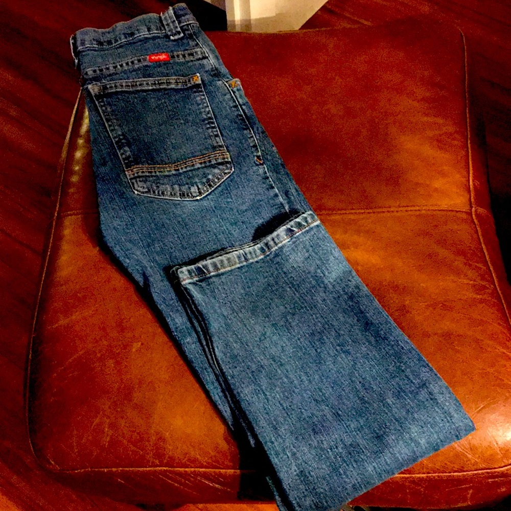 Boys Youth size 16 Regular Wrangler blue jeans.